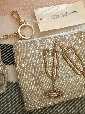 🥂 NWT Luxe Beaded Champagne Pouch & Charm Set. On 34th